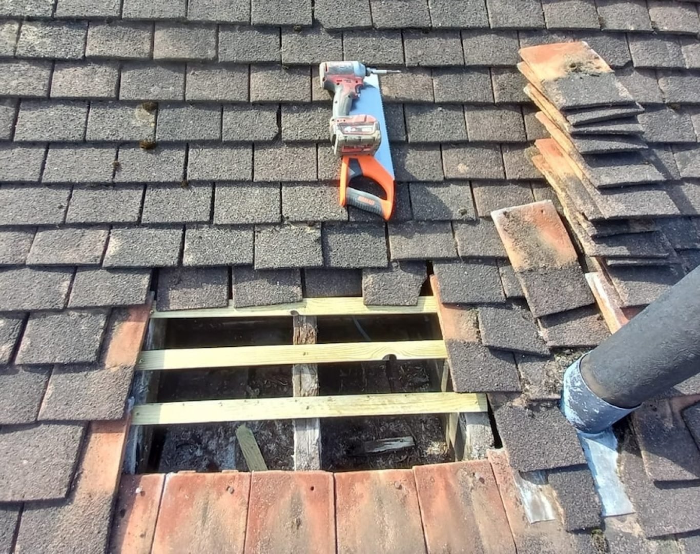Roofing crew sealing flashing and installing new underlayment during repair project in Charleston, SC